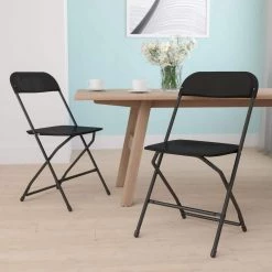 Black Plastic Seat with Metal Frame Folding Chair (Set of 2) by Carnegy Avenue -Carnegy Avenue Sales black carnegy avenue folding chairs cga le 274397 bl hd 31 1000