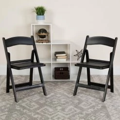 Black Vinyl Seat with Resin Frame Folding Chair (Set of 2) by Carnegy Avenue -Carnegy Avenue Sales black carnegy avenue folding chairs cga le 274423 bl hd c3 1000