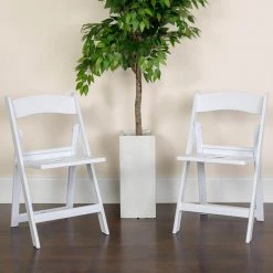 White Resin Seat with Resin Frame Folding Chair (Set of 2) by Carnegy Avenue -Carnegy Avenue Sales white carnegy avenue folding chairs cga le 274425 wh hd c3 1000